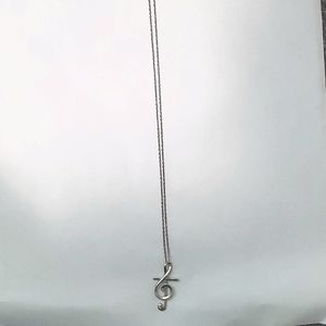 Treble clef necklace